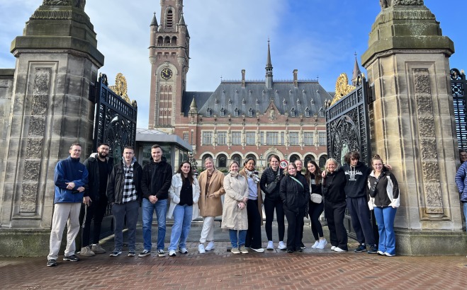 Students in front of castle on Heart of Europe study abroad trip