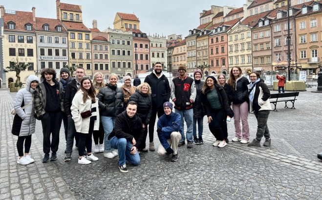 Students on the Heart of Europe Study Abroad Trip in a courtyard