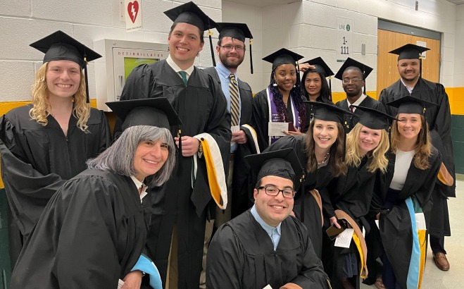 Big group of diverse graduate students before commencement