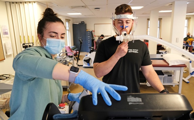 Sports Exercise Lab student being evaluated on treadmill