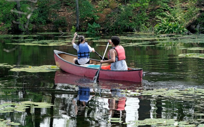 Students in canoe on Grove Pond in Ayer