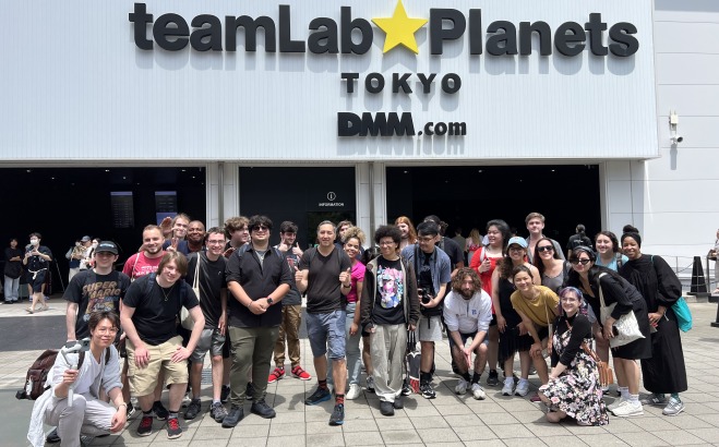 Group of game design students in Japan at team lab planets
