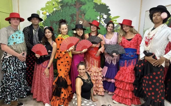 Giancarlo with a group of people ina flamenco class