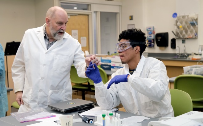 Teacher and student in the cell culture lab