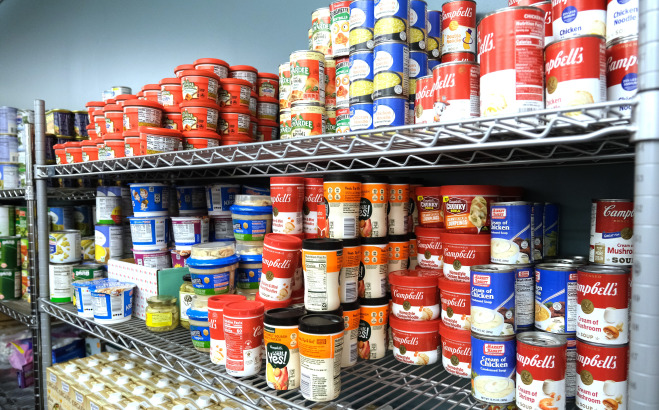 Shelves of soups, can goods, and toiletries in the Falcon Bazaar