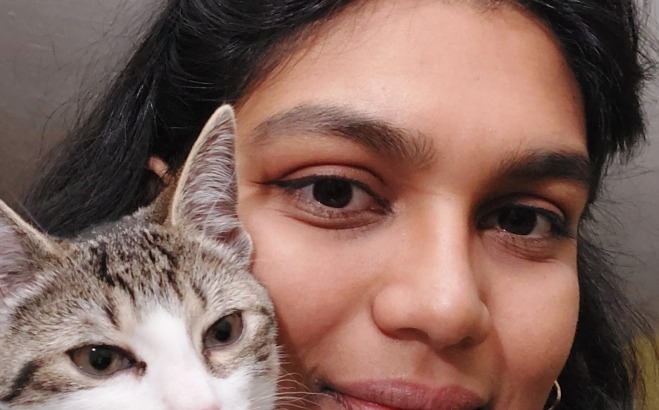 Jess Patel ACT with her cat