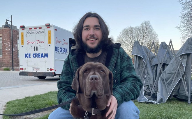 Jonathan Rajotte ACT outside with his dog