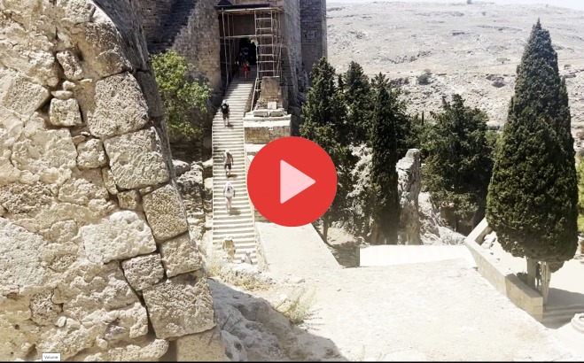 Rocks and Trees in Greece with video play button over it