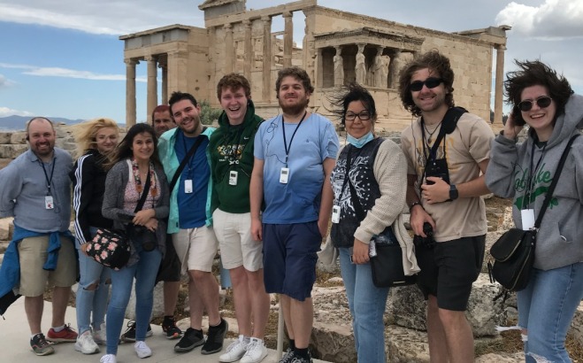 Group of students in Greece in front of the famous columns