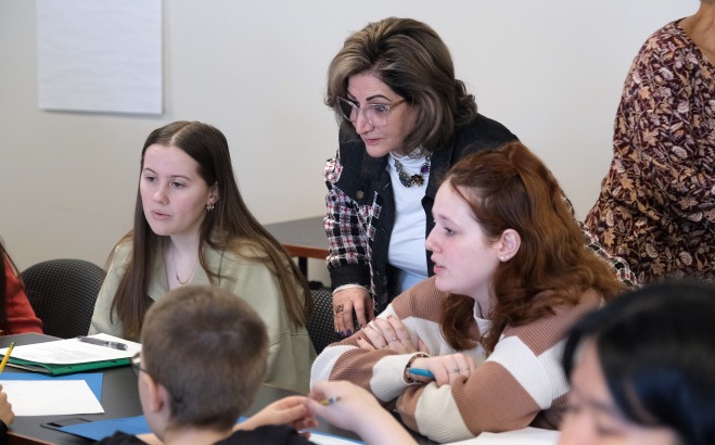Mojdeh Dean of Education in class with students