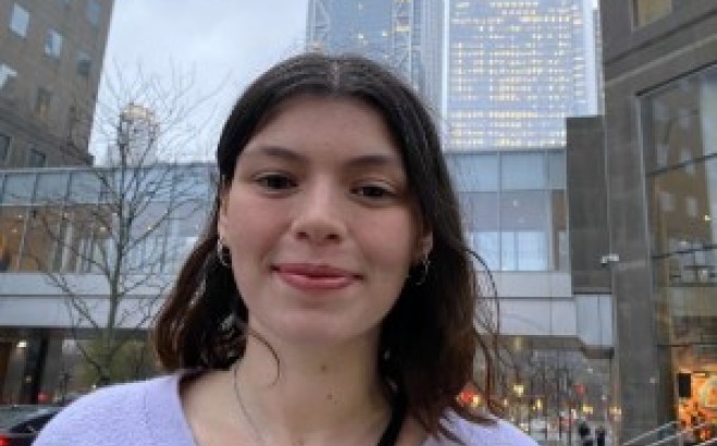 Lexi Sandmann ACT tutor outside in city.
