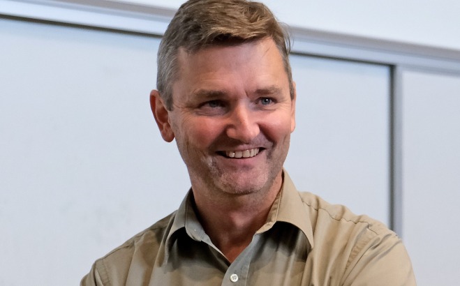 Rob Hynes smiling at event
