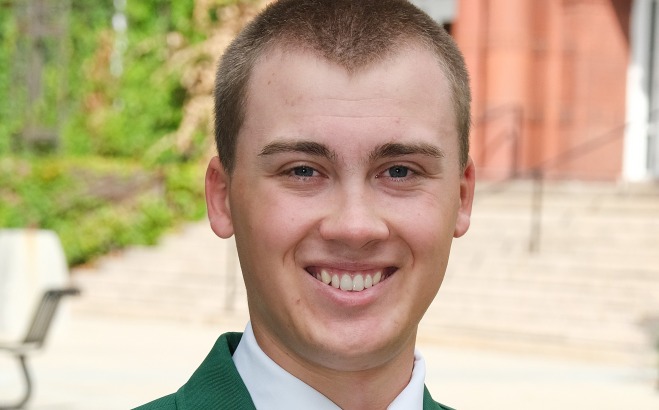 Kole Broderick headshot outside in front of Thompson Hall. 