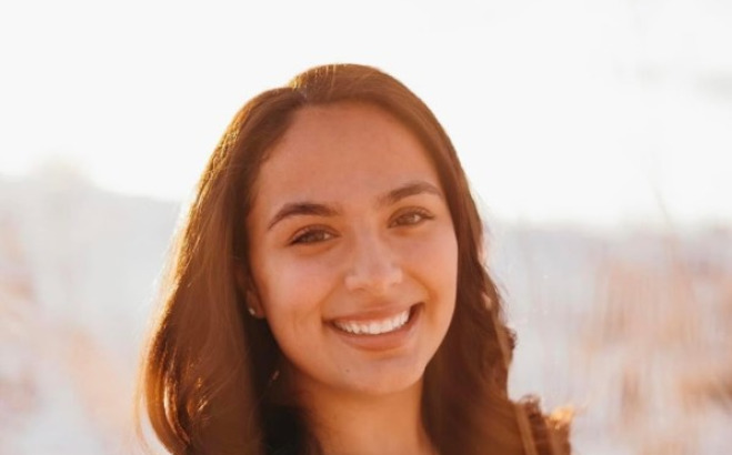 Ariana Baez ACT outside in the sunset.