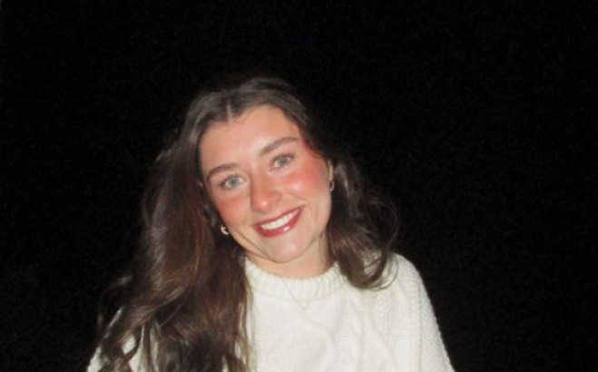 Carolyn Brodeur tutor outside in the dark.