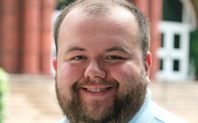 Headshot of Alex Cochran SU SUCCESS coach.