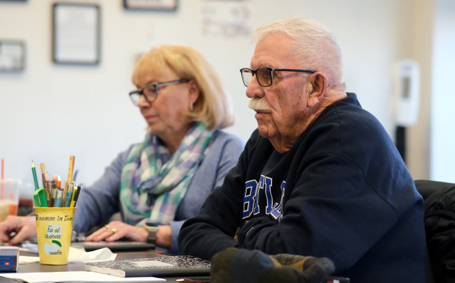 Male and female seniors in an ALFA classroom.