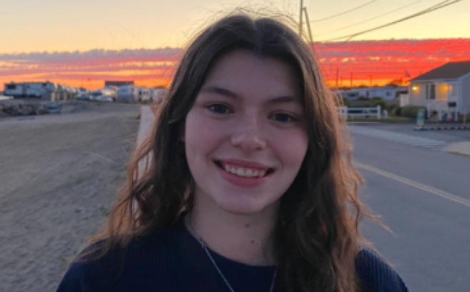 Lexi Sandmann outside at beach.