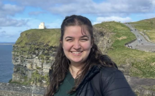 Madeline Curran ACT Tutor outside in Europe by coast.