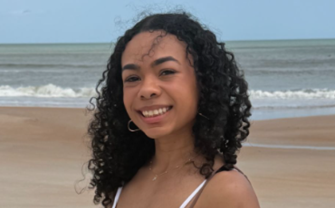 Trish Scott outside at beach.