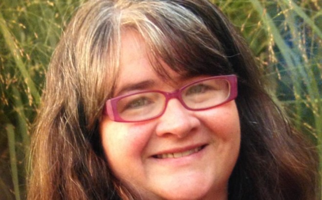 Jodi Helenora Stevens community music instructor outside.