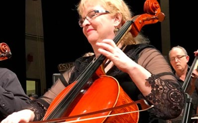 Laurie performing on the cello.