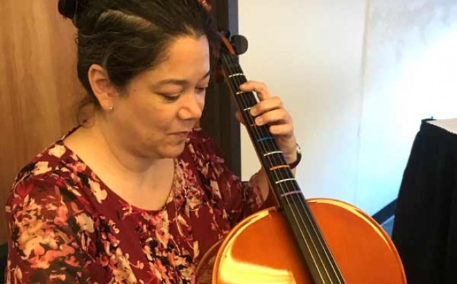 Student playing the cello