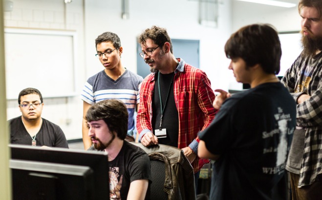 Professor Jeff Warmouth with Game Design students