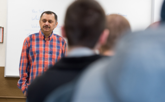 Dr. Mahadev teaching a class