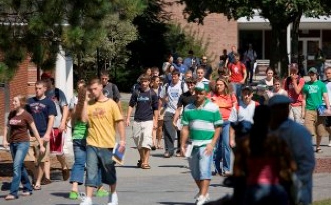 Group of people walking around campus