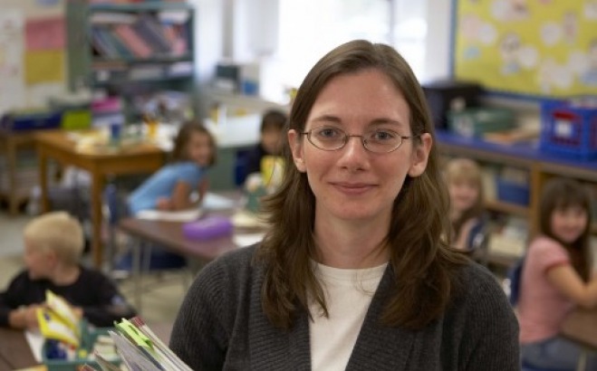 Portrait of an elementary teacher in a classroom
