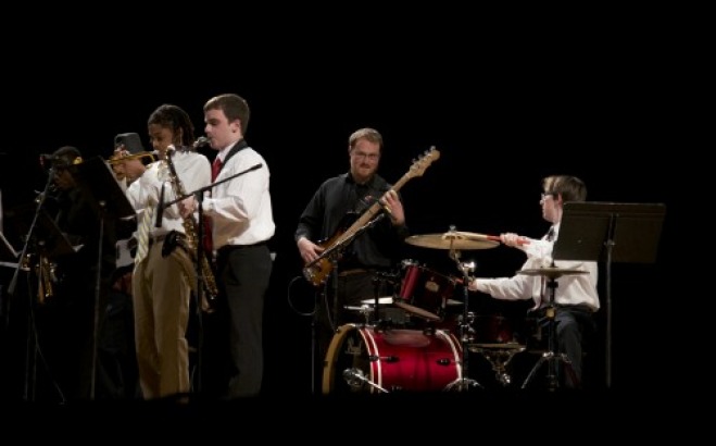 The jazz band performing on stage