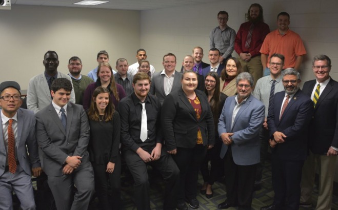 Business students share research findings with city leaders