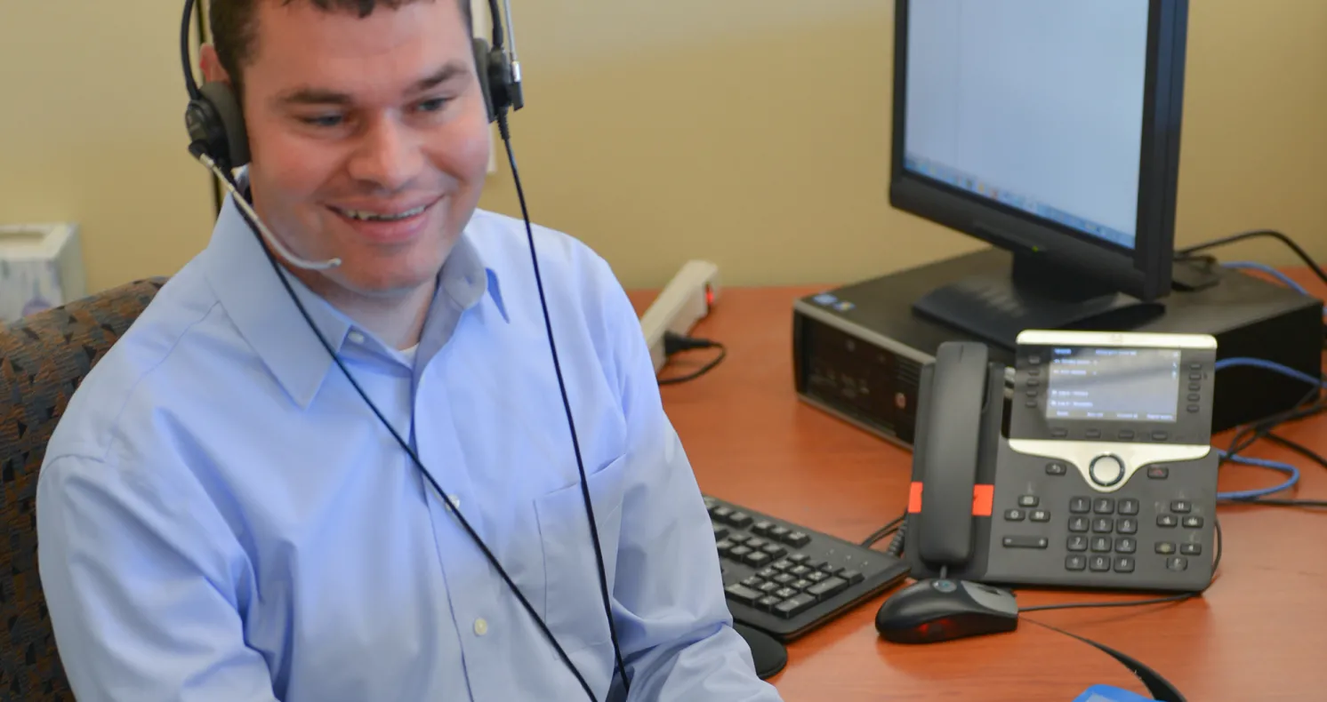Portrait of Tim Vernon '06 working at Eversource
