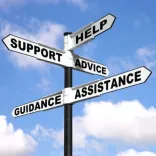 A signpost with arrows pointing in various directions labeled with the words Help, Support, Advice, Guidance, and Assistance.