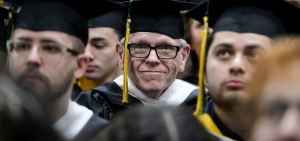 Stephen Wells smiles at winter commencement 2023