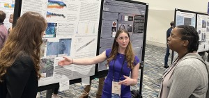 Student Madison Ambrogi '26 and alum Kate Messer 24 presenting research in Texas