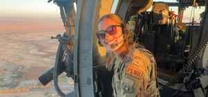 Image of Julia Gauvin in a helicopter