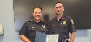 Fitchburg police and graduate Travis Morcaldi