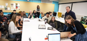 Alum Cillea Houghton with students in Rob Carr's classroom