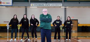 Lacrosse coach Rick Terrio and players at the Rec Center