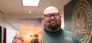 Nathan Fisher, a maintainer employee, writes book
