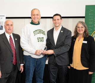 President Lapidus, Biff Quinn, Michael Kushmerek and Dawn Morton at Alumni Awards 2023