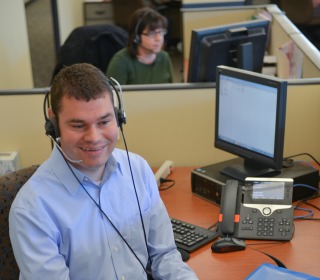 Portrait of Tim Vernon '06 working at Eversource