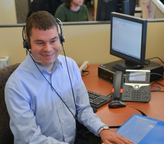 Portrait of Tim Vernon '06 working at Eversource