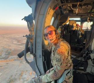 Image of Julia Gauvin in a helicoptor