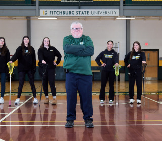 Lacrosse coach Rick Terrio and players at the Rec Center