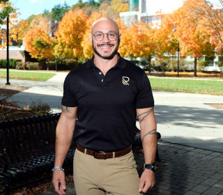 Alum Anthony Bizzotto standing on quad works at Revive