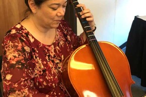 Student playing the cello