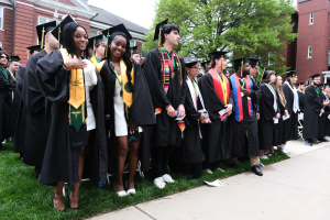 Students pose in regalia at Spring 2025 undergraduate commencement